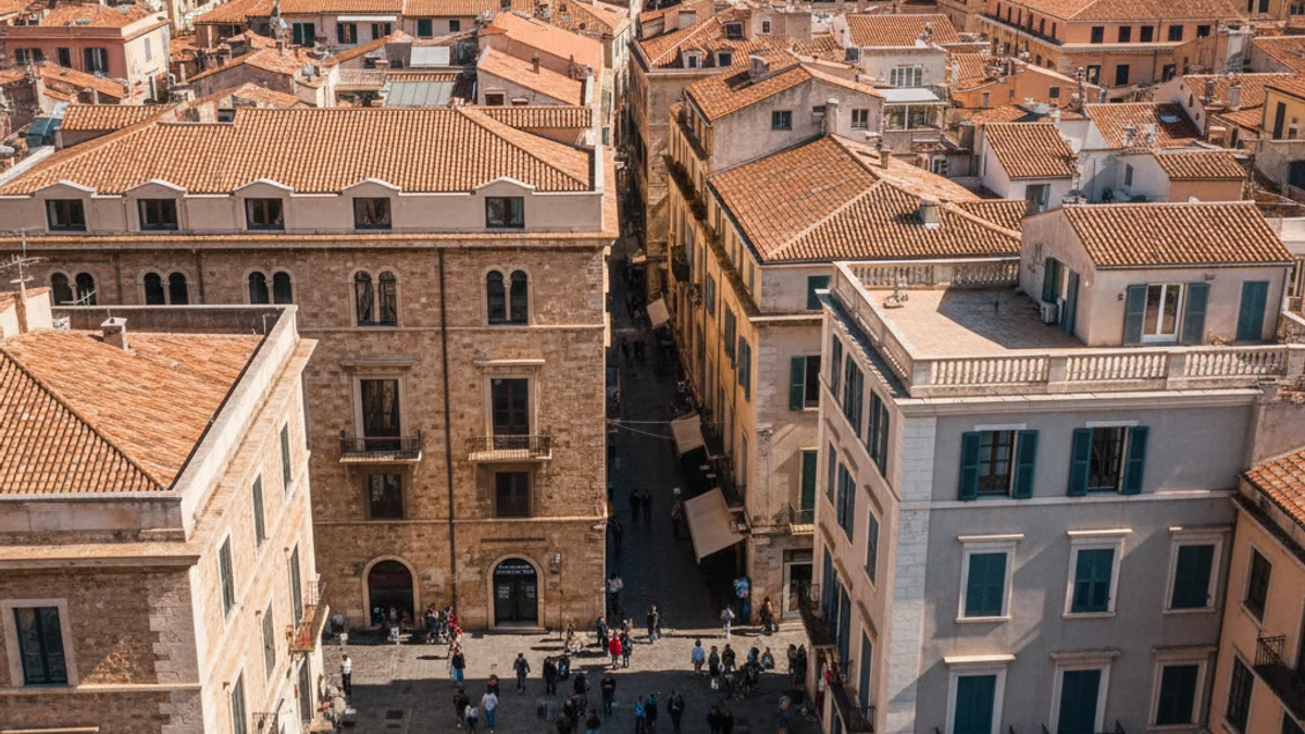 Vista aérea de un barrio residencial con edificios de pisos y casas en Cataluña.