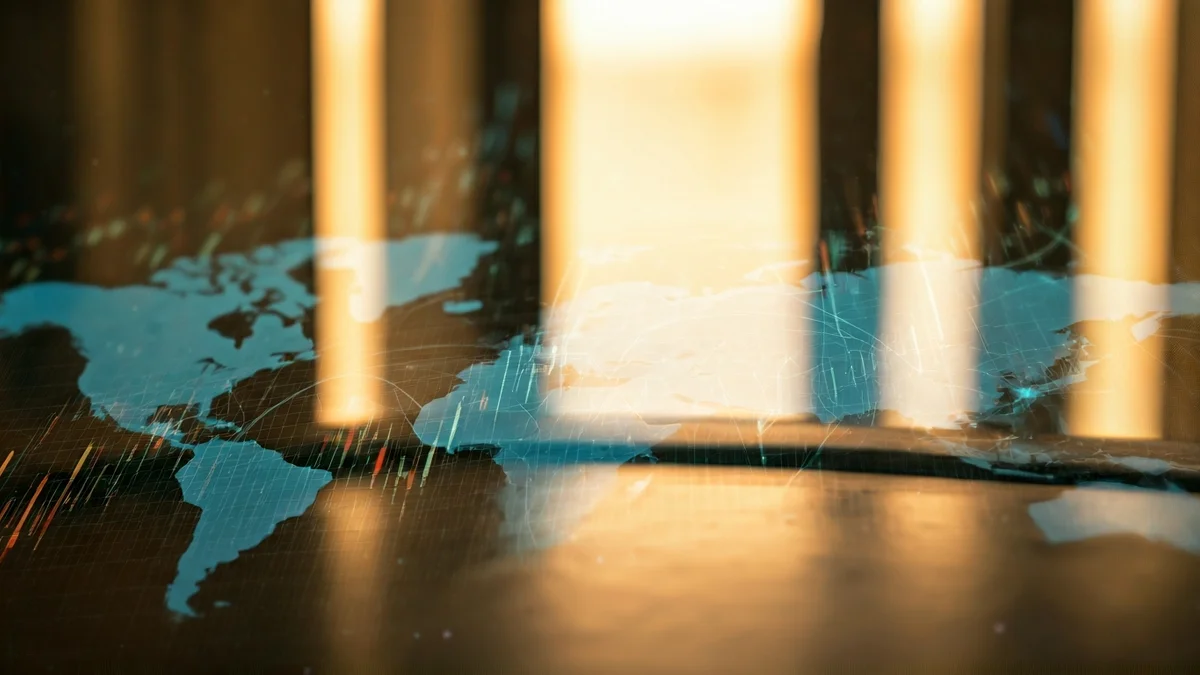 Imagen genérica de un mapa mundial con gráficos financieros superpuestos, simbolizando el impacto económico global de un conflicto.