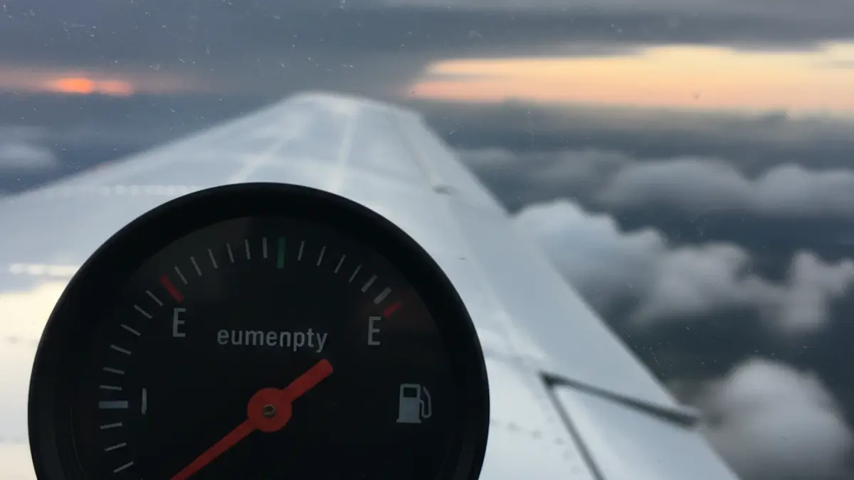 Generic image of an airplane fuel gauge, symbolizing scarcity and travel uncertainty.