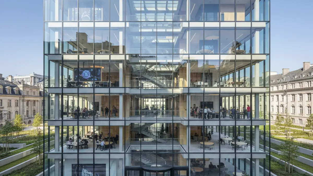 Image of a modern university building with large glass facades, symbolizing innovation and technology transfer.
