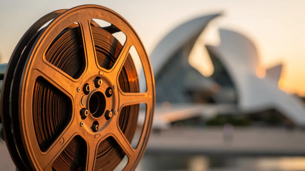 Generic image of film reels with the City of Arts and Sciences in the background.