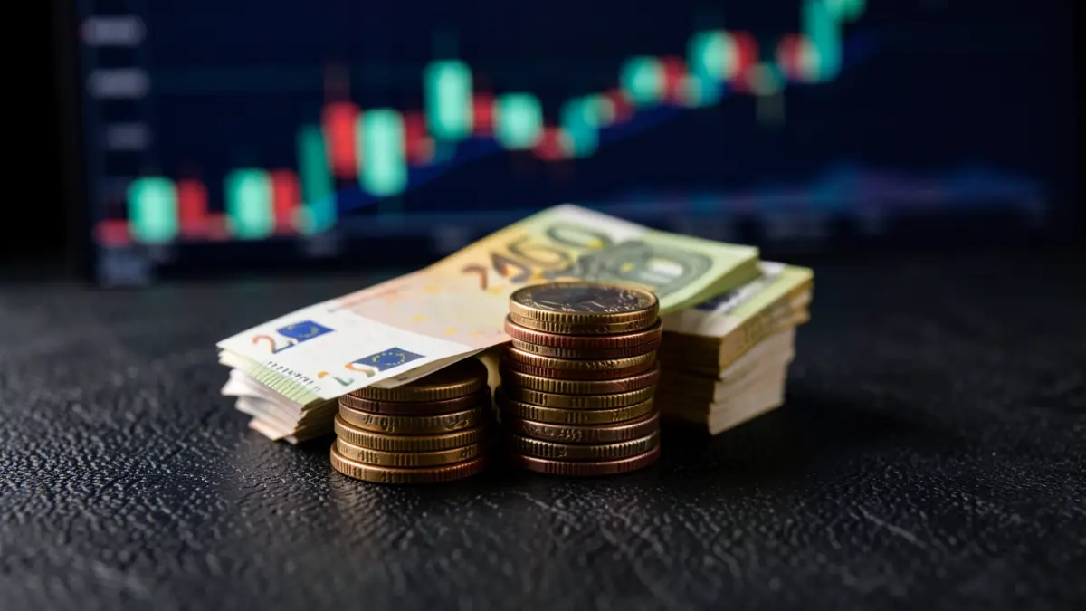 Generic image of money and financial graphs.
